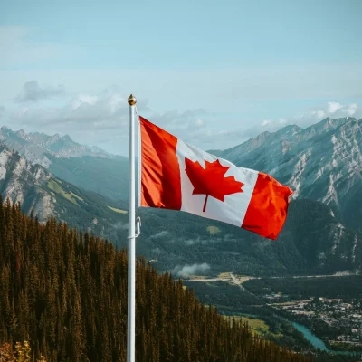 closeup-shot-of-the-waving-canadian-flag-with-moun